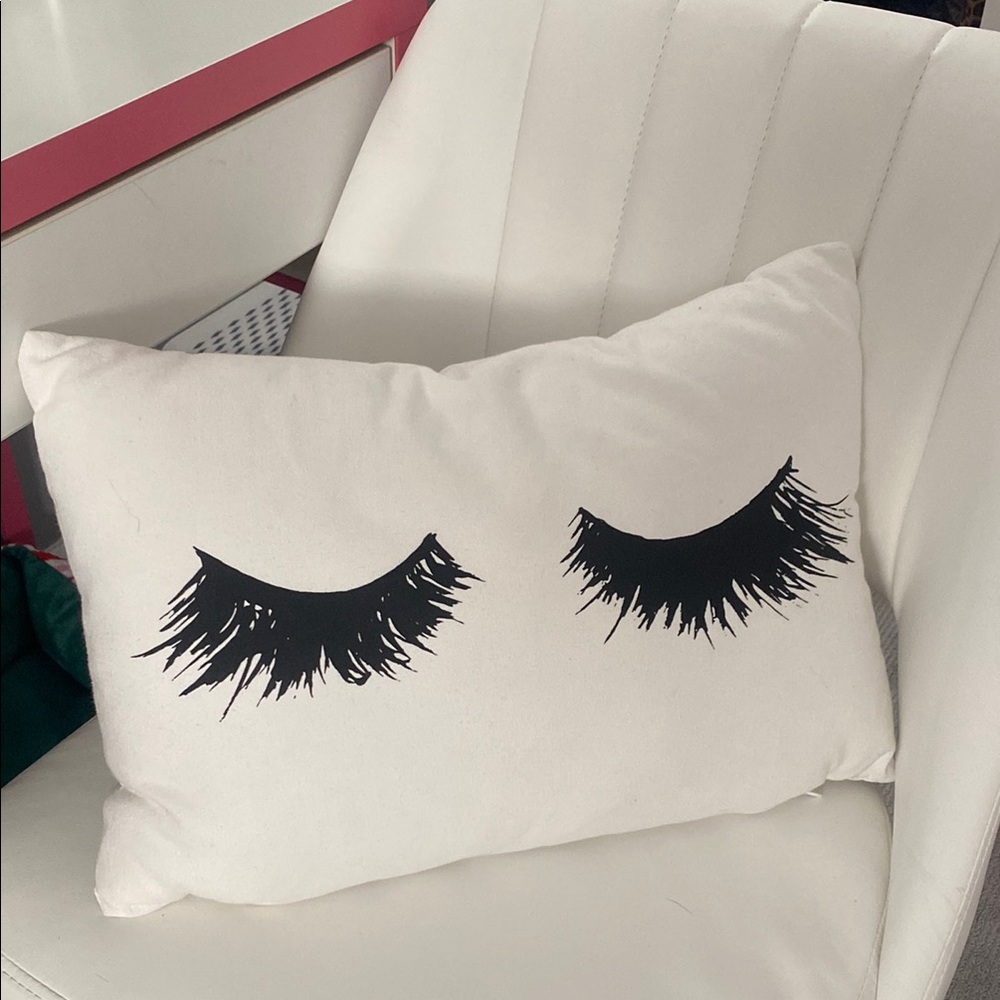 White Pillow with Black Eyelash Design